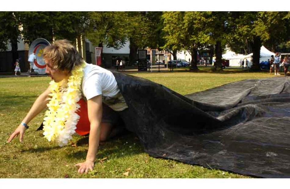 Gus Patterson emerges from a hot black sheet. Photo by Jane Dawber.