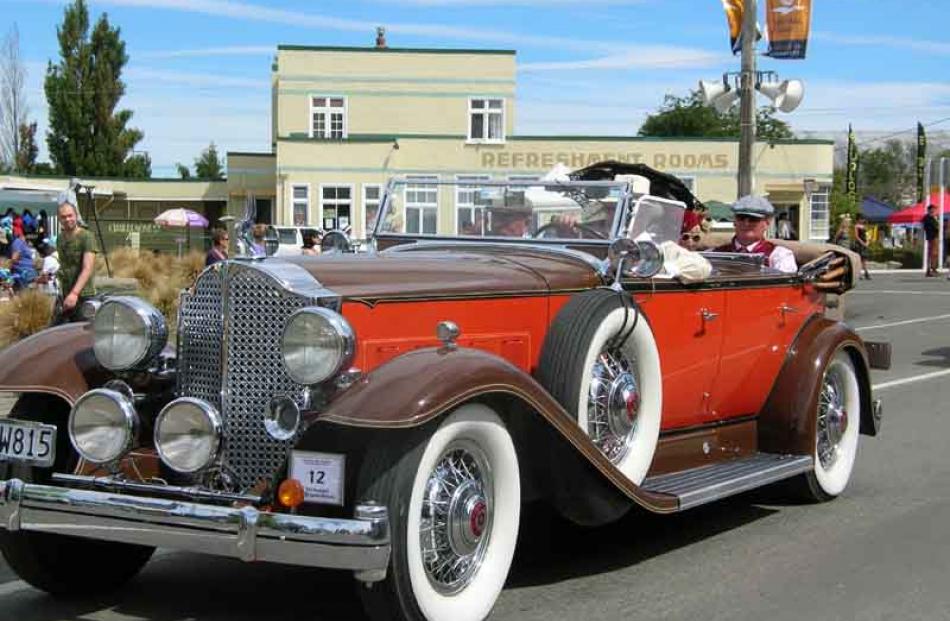 Restored relic . . . A 1932 Packard from Wanaka is driven through Ranfurly's main street as part...