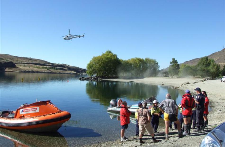 Sergeant Ian Kerrisk (second from right) briefs the boat crews involved in trying to locate a...