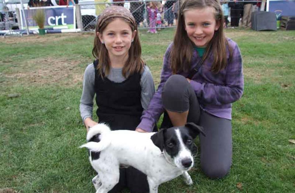Jessie Fothergill (8) and Hayley Yule (8), both of Wanaka, with their dog Snoopy.