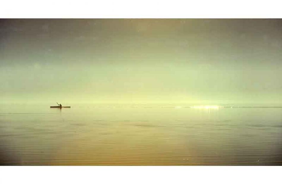 A kayaker paddles up Otago Harbour though the fog on Monday. Photo by Craig Baxter.