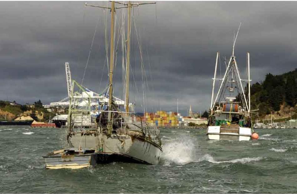 Deborah Bay yacht Mutineer is pulled to safety by Port Charmers fishing vessel Sanspeur after...