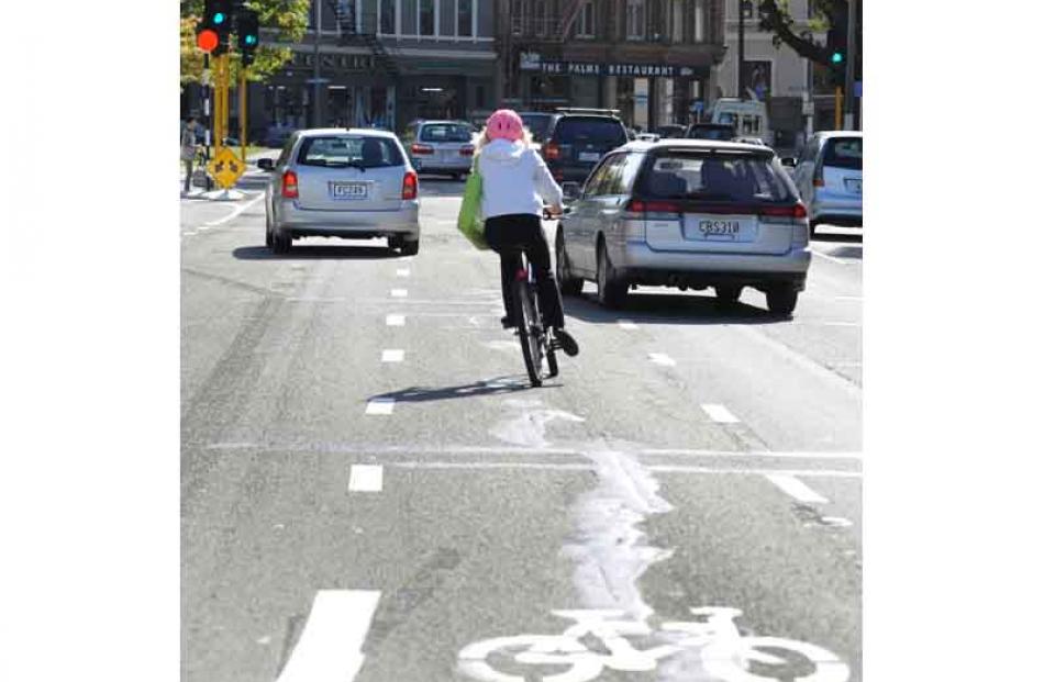 Vehicles cross the cycle lane on Crawford Street near Queens Gardens to access the left lane....