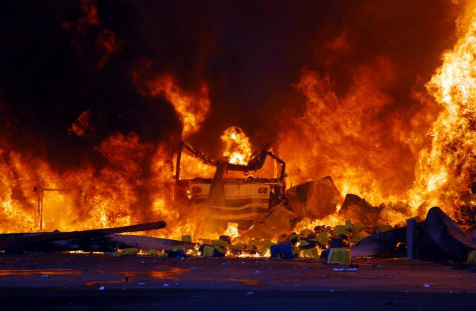 A fire truck is destroyed by fire. Photo by NZPA Phillipa Stevenson.
