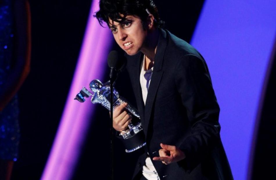 Singer Lady Gaga accepts the award for best female video for 'Born This Way' at the 2011 MTV...