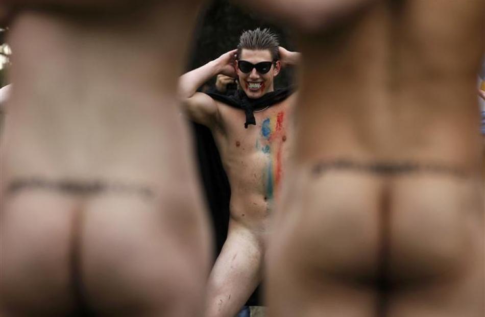 A naked rugby player of the Romanian Vampires performs a Haka. REUTERS/Stefan Wermuth