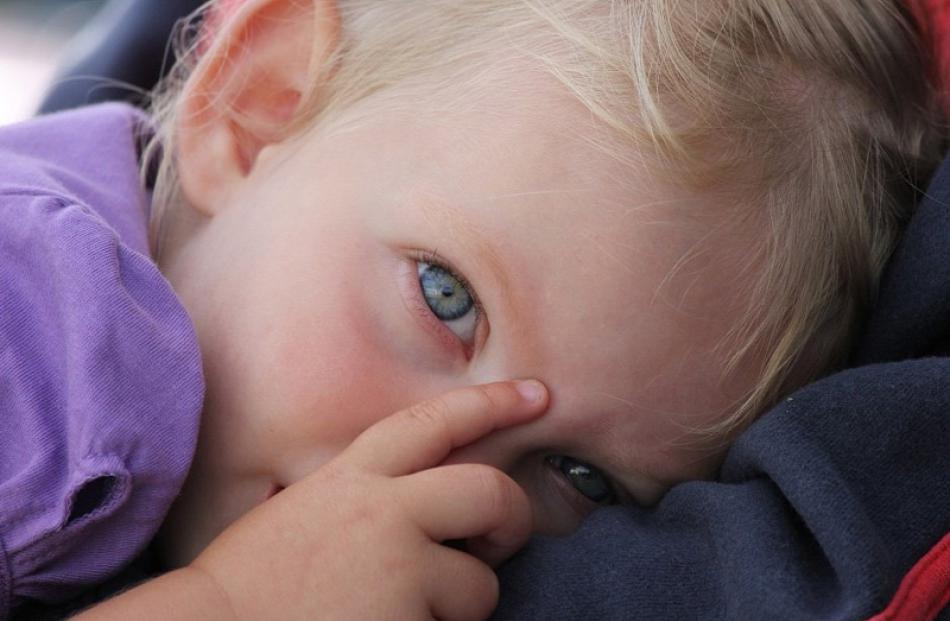 Hannah Macdonald (21 months), of Waitahuna, rests after her first visit to the beach at Toko...