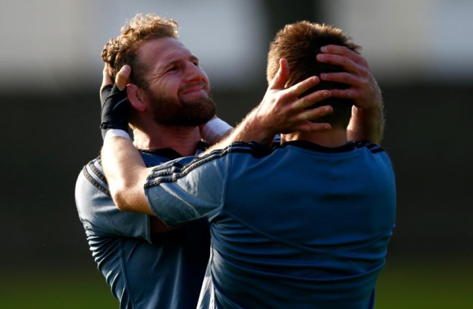 Kieran Read (L) warms up with Richie McCaw during an All Black training session at Sophia Gardens...
