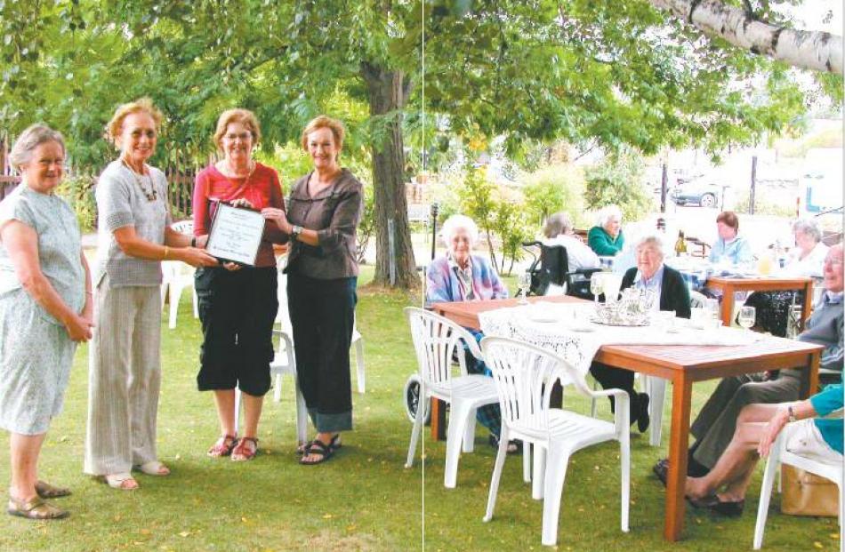 Special day: Castlewood residents enjoy afternoon tea in the garden as (from left) Alexandra...