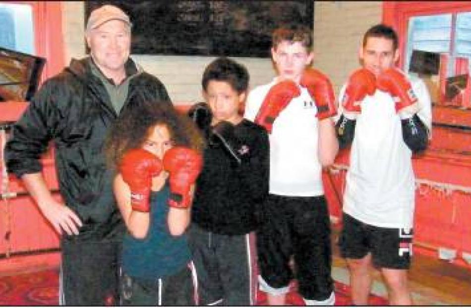 The line-up: Gore Boxing Club coach Russell Newton and young boxers (from left) Tiarete Wanahi ...