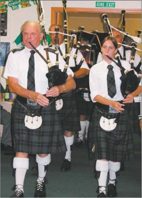 The skirl of the pipes: Alex Joyce, of Alexandra, and Beth Black, of Cromwell, lead the Alexandra...