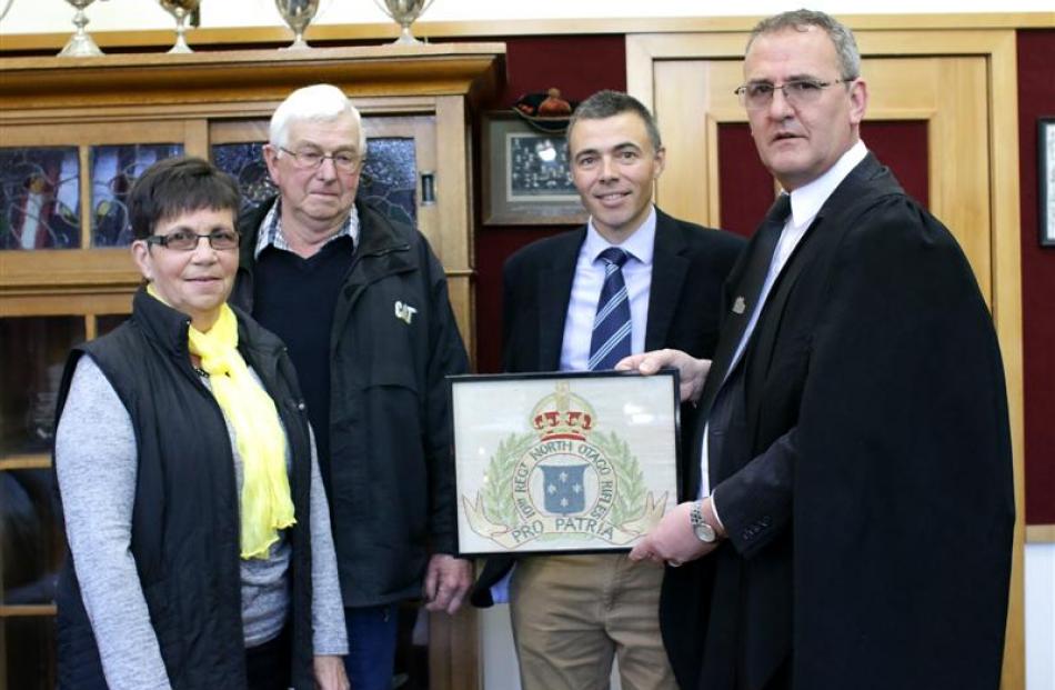 (From left) Bev Manson, Robin Manson and Greg Manson present Waitaki Boys' High School rector...