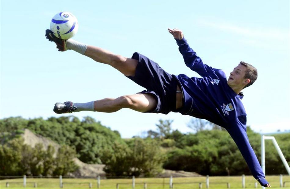 Joel Stevens shows his scoring style at training at Tahuna Park. Photo by Peter McIntosh.