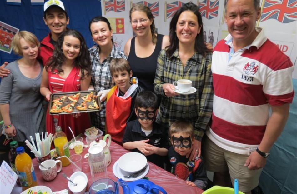 KingsView School Cultural Festival stallholders (from left) Jhislaine Cruz-Mermy, Yoran Matiussi,...