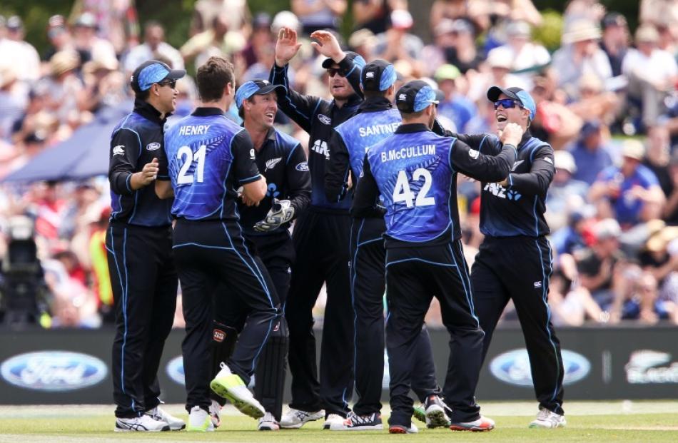 New Zealand players celebrate the wicket of Angelo Mathews of Sri Lanka during the first One Day...