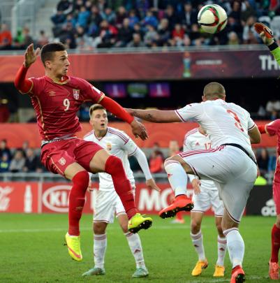 Serbia's Ivan Saponjic celebrates after heading the ball into the net from a corner kick just...