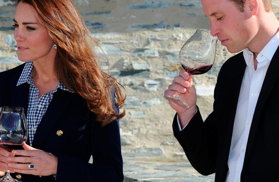 The Duke and Duchess of Cambridge sample the wares during their visit to Amisfield Winery, near...