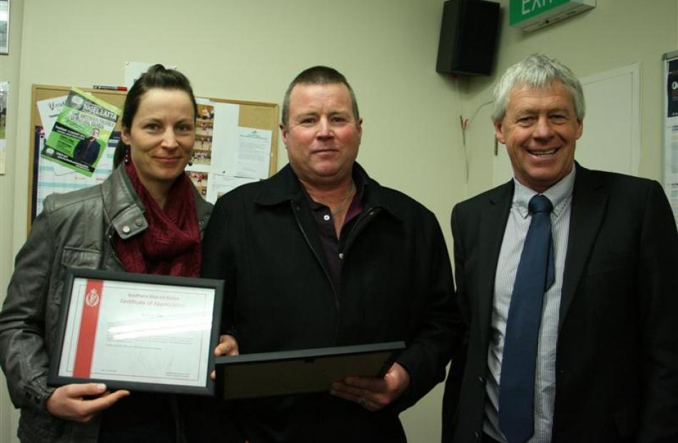 Veronika and Mark Sim were presented with a  police certificate of appreciation  by Central Otago...