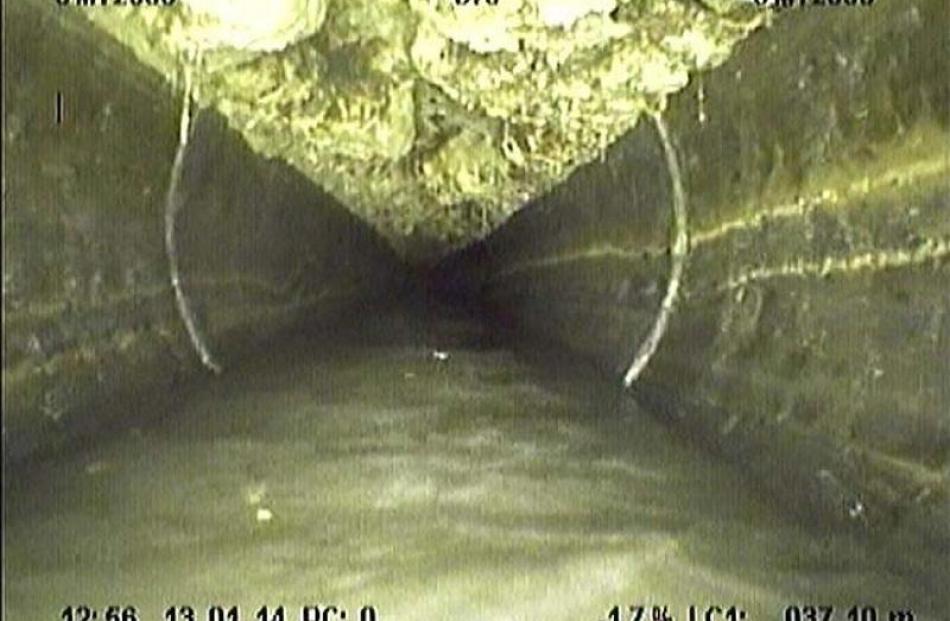A CCTV inspection of the  Frankton sewer pipe which was blocked recently,  shows the fat (top)...