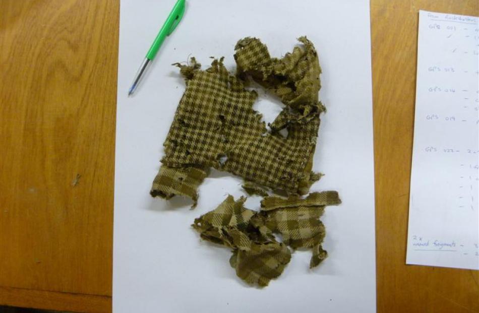 A cloth fragment removed from a hut in the Roxburgh Gorge. Photos by the Dept. of Conservation.