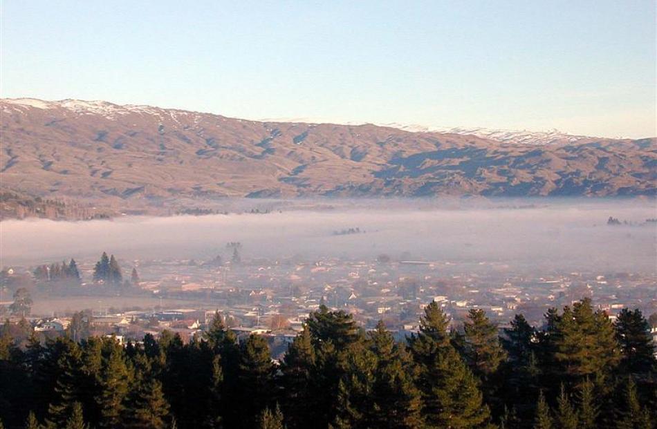 A combination of smoke and fog, covers Alexandra. Photo by ODT.