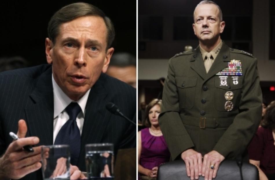 A combination photo shows CIA Director David Petraeus and General John Allen, the top US...