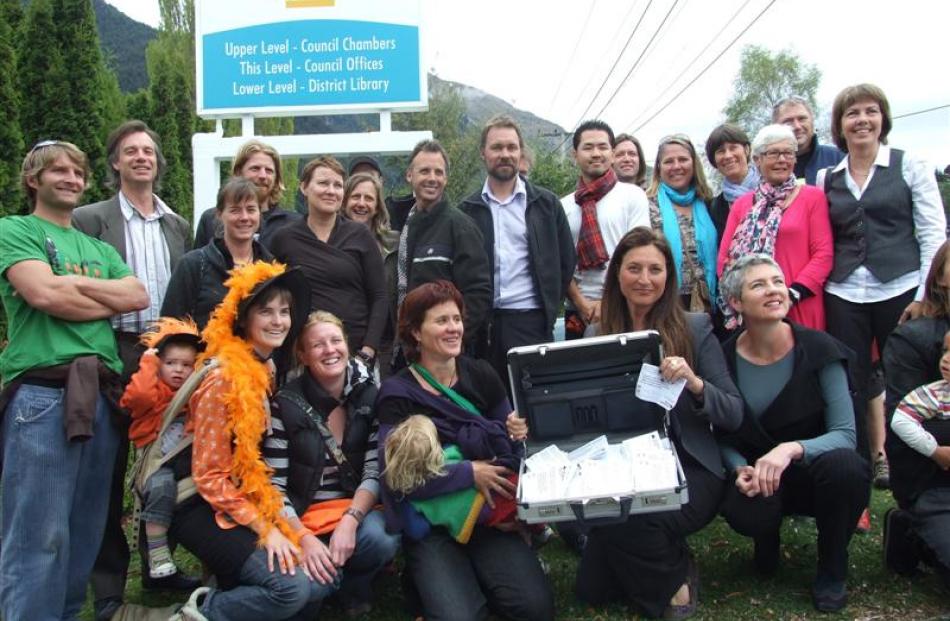 A crowd of Wanaka Wastebusters supporters, who yesterday travelled to Queenstown to speak at the...