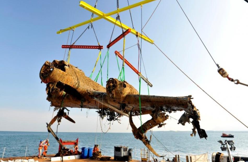A Dornier 17 German bomber aircraft which crashed into the sea during World War 2 is raised by a...