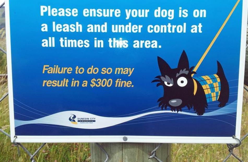 A Dunedin City Council sign requiring dogs to be on leashes. Photo by ODT.
