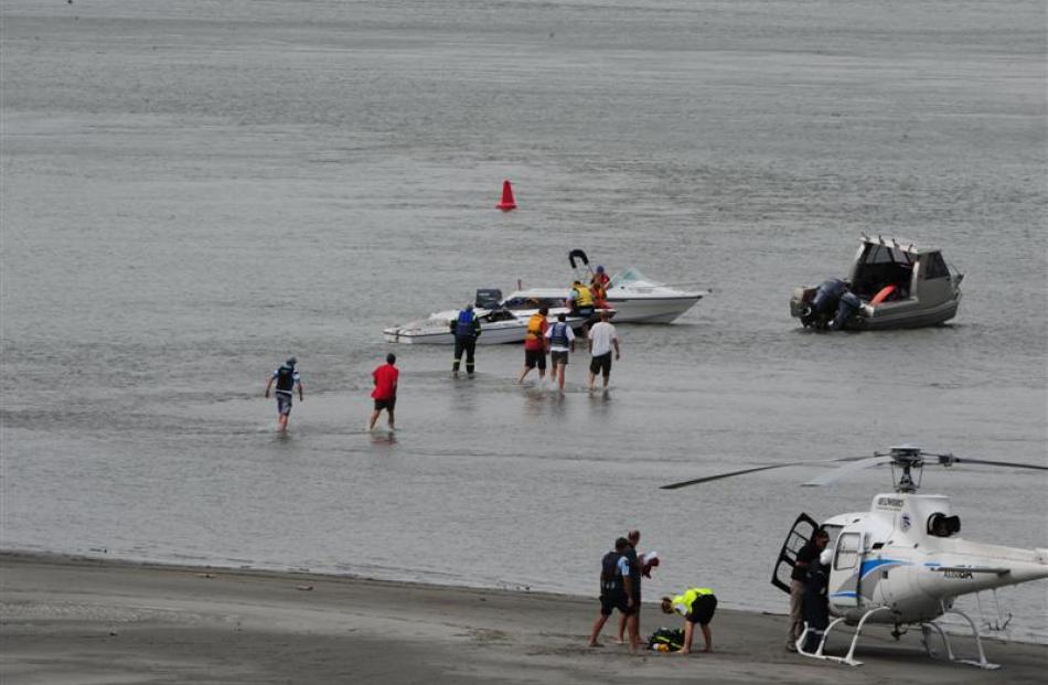 A female patient is carried to a  helicopter after a boating accident on Lake Dunstan in January...