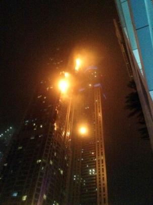 A fire blazes at 'The Torch', a residential high-rise tower in Dubai. Photo Reuters
