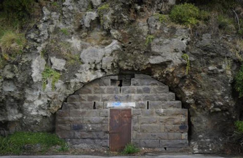 A locked door beside Portobello Rd, near the beginning of Otago Peninsula, leads to a cave once...