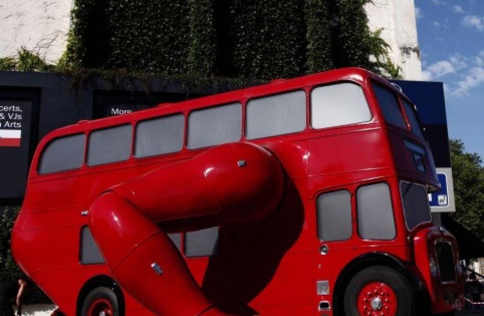 A London bus that has been transformed into a robotic sculpture by Czech artist David Cerny is...