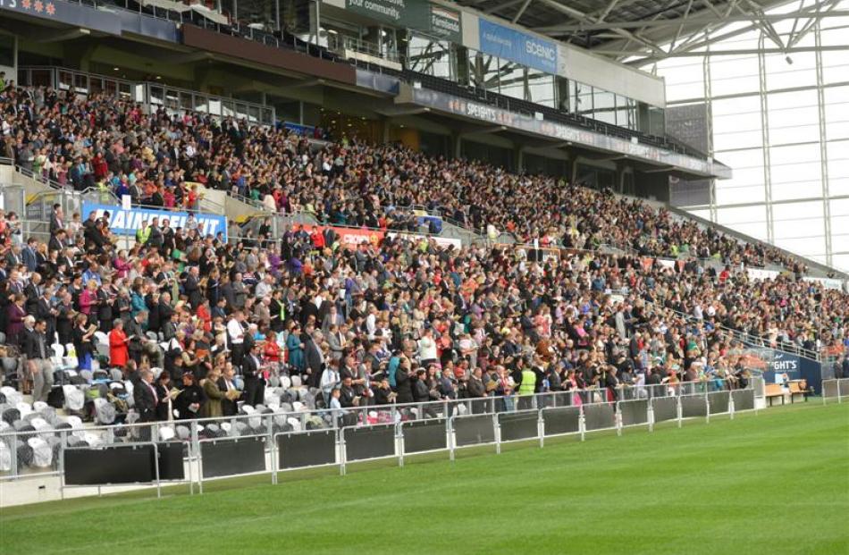 A packed Forsyth Barr Stadium south stand at the Jehovah's Witnesses convention. Photos by...