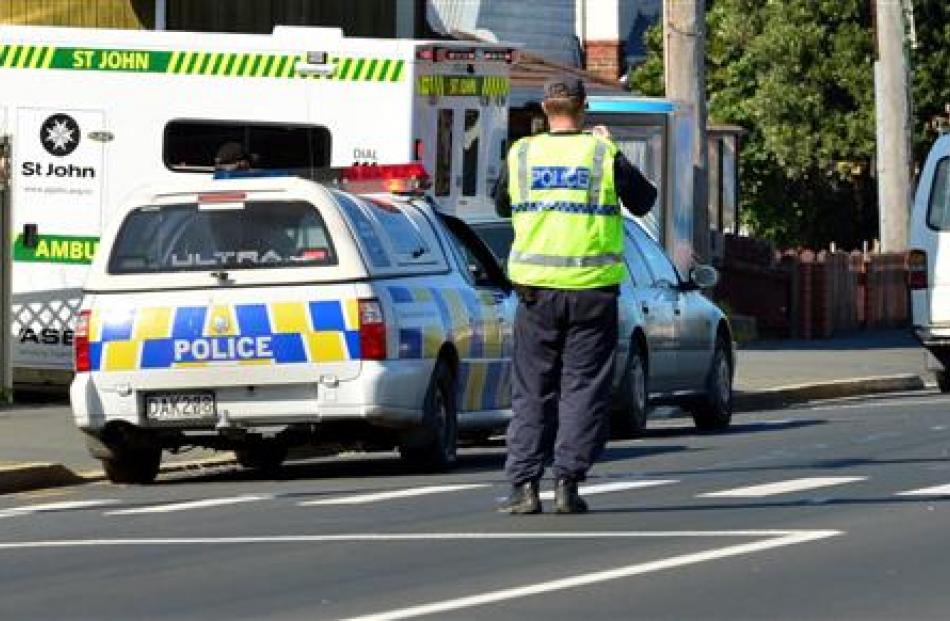 A police officer stands at the pedestrian crossing in Prince Albert Rd where  Mrs Smith was hit...