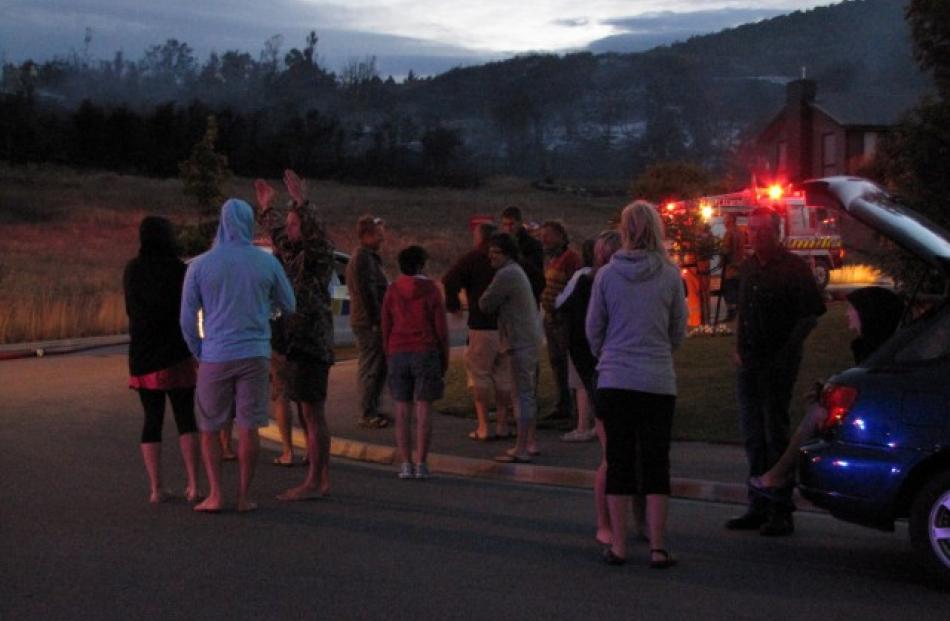 A scrub fire this morning meant an early start for some Wanaka residents. Photo Marjorie Cook