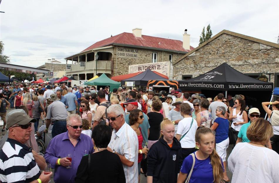 A section of the crowd at the Clyde Wine and Food Harvest Festival yesterday. Photos by Jono...
