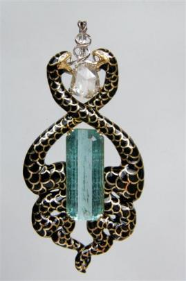 A Tony Williams creation. Serpent pendant in 18ct gold with aquamarine, diamonds and enamel.