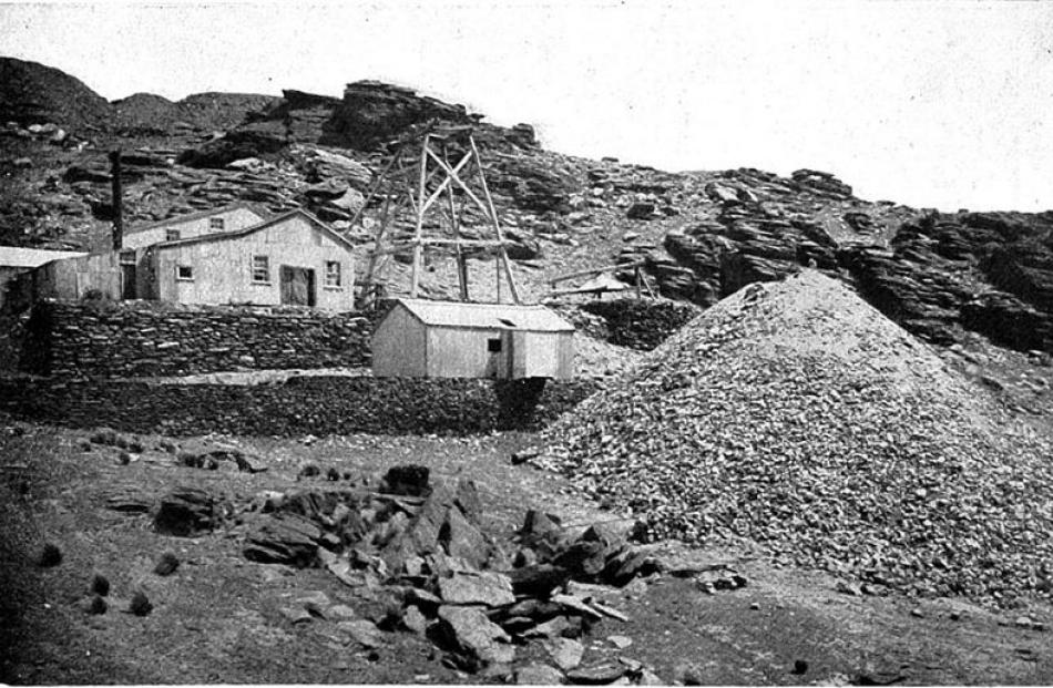 A view of the main engine house and shaft of the Bendigo mine in the late 19th century.  -Otago...
