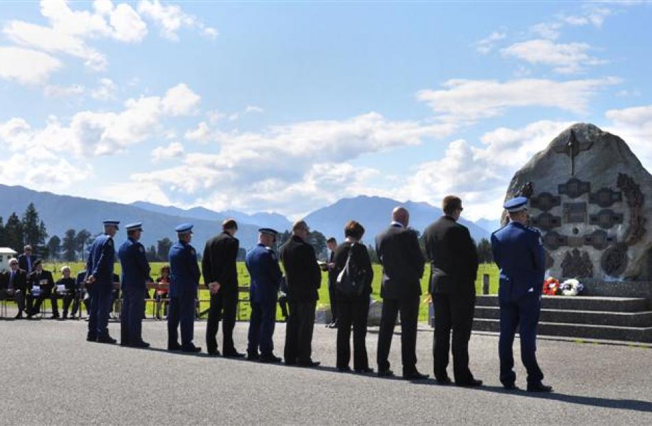 A West Coast-Tasman police contingent marks Police Remembrance Day at Kowhitirangi yesterday by...