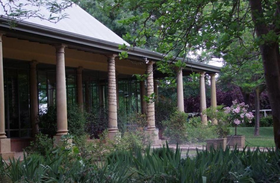 A wide verandah helps keep the house cool.