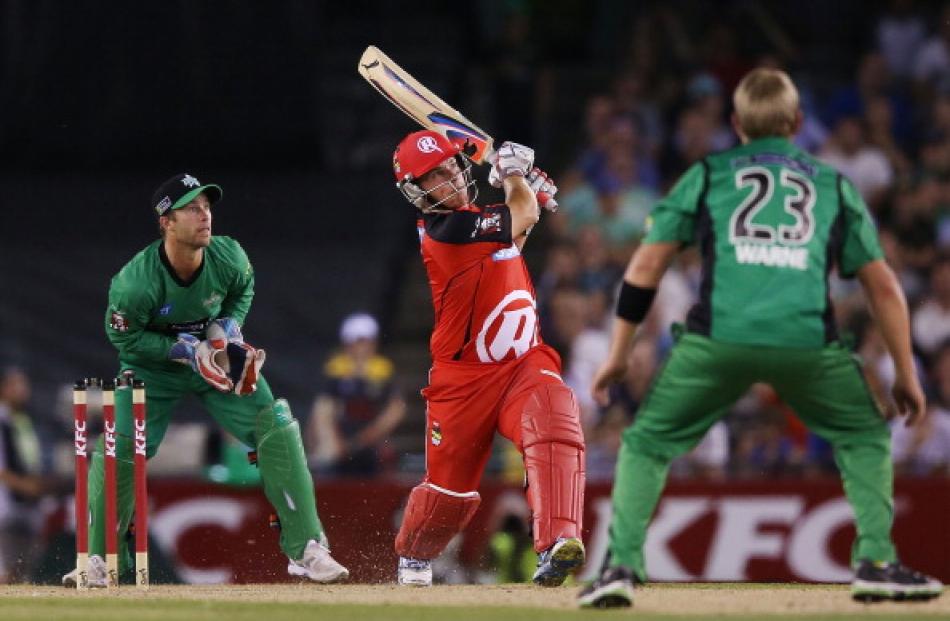 Aaron Finch of The Renegades hits Shane Warne of The Stars for six by during their Big Bash...