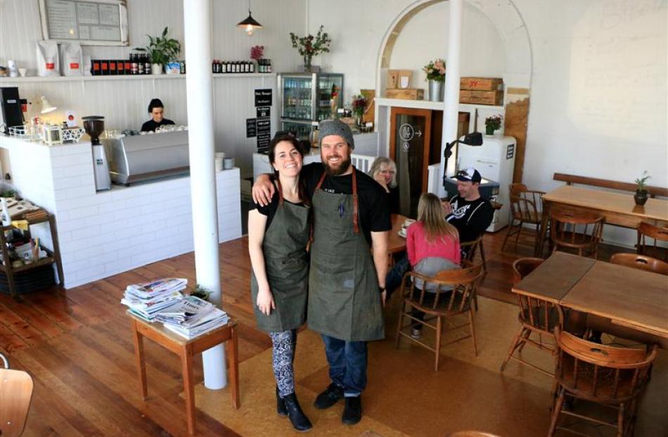 Abby McErlane and Dan Bregmen stand in their new cafe, Tees St, on opening day. Photo by Rebecca...