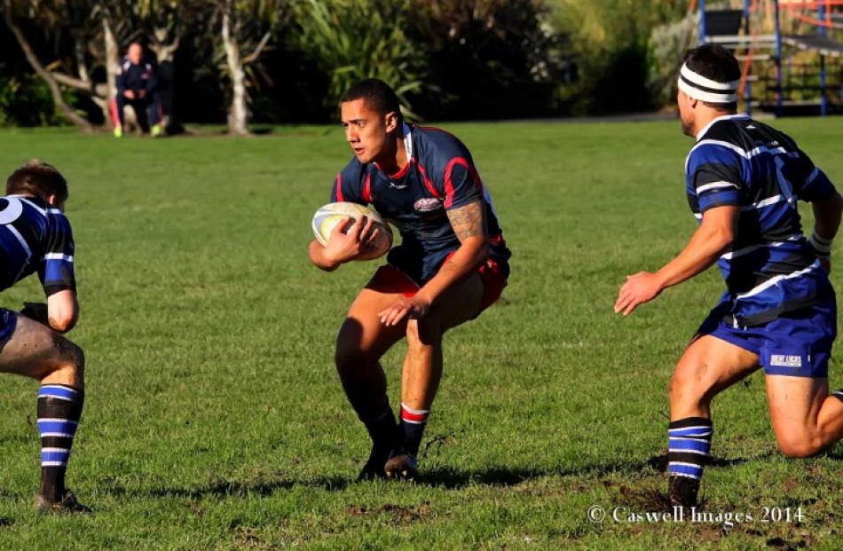 Action from the match between Harbour and Kaikorai at Watson Park. Photos Caswell Images