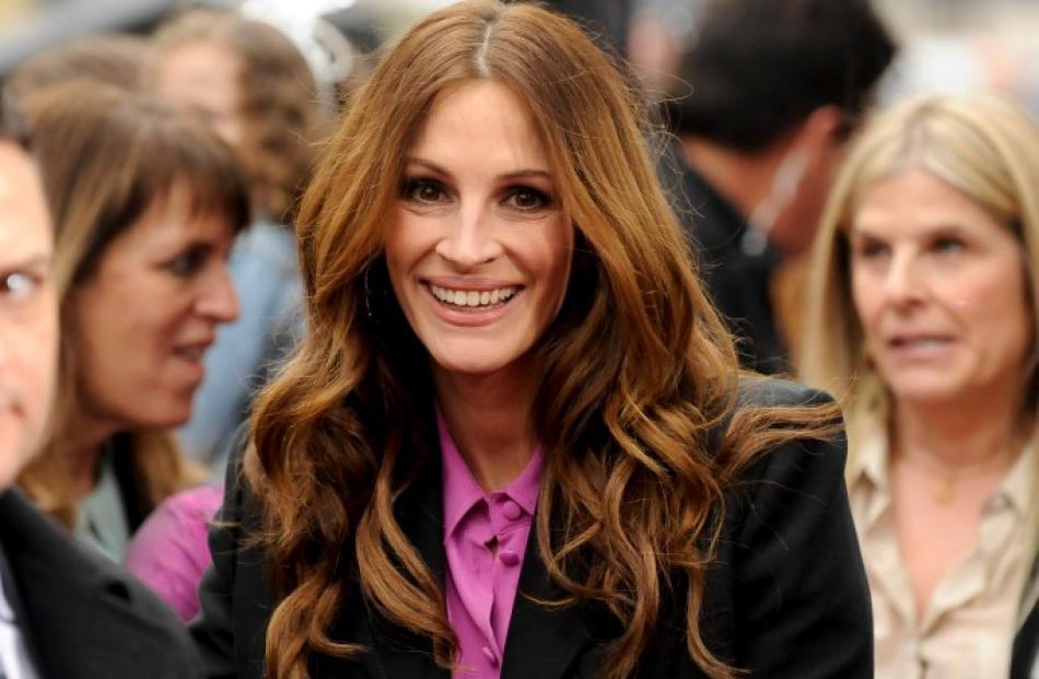 Actress Julia Roberts arrives at the Hollywood world premiere of 'Mirror Mirror' in Los Angeles,...