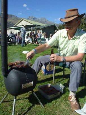 Adam Sutch, of England, gets to grips with an 'Ozpig' at the Head of the Lake Harvest Festival in...