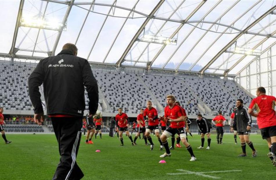 Adam Thomson (foreground centre) trains with the All Blacks at the Forsyth Barr Stadium in...
