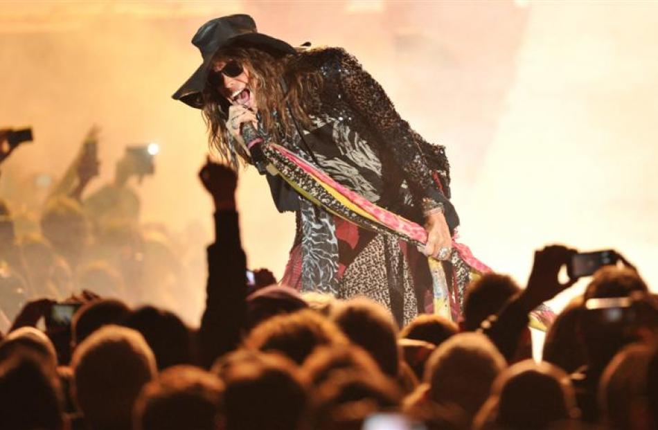 Aerosmith frontman Steven Tyler revs up the crowd during last night's concert at Forsyth Barr...