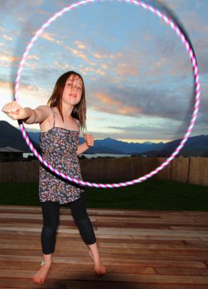 Showing her hula hoop style is Albie Haynes (10), of Wanaka, in Wanaka on Christmas Day. Photo by...