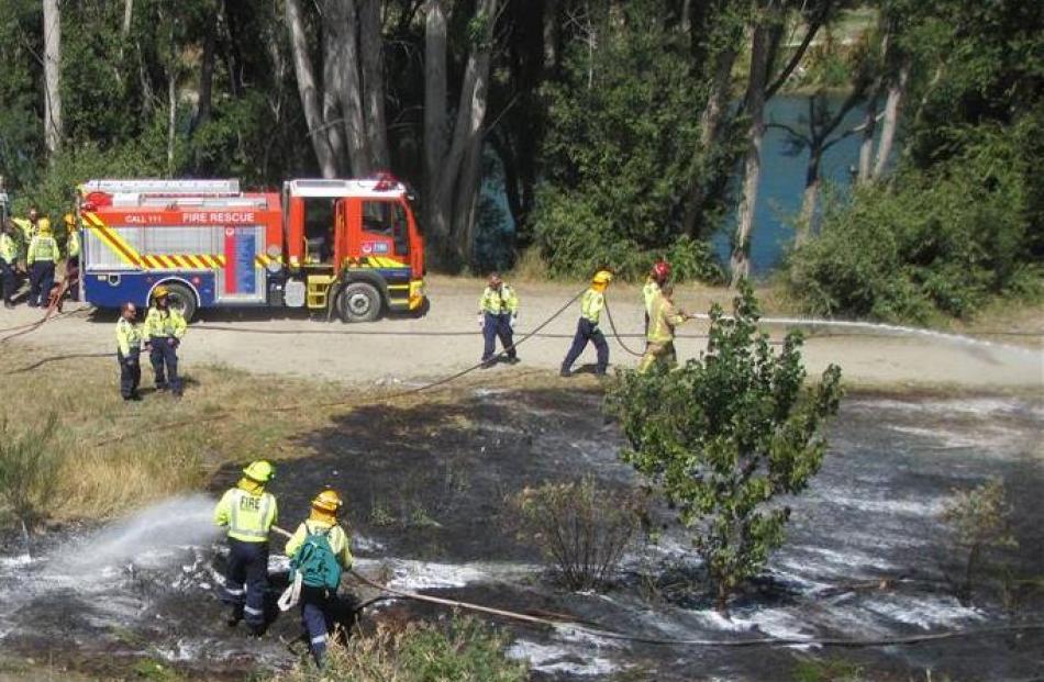 Alexandra firefighters quickly contained a fire  which was heading towards homes yesterday. Photo...